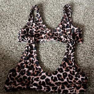 Two bikini tops with cheetah print